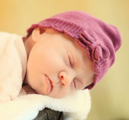 Young beauty baby sleeping in crateの写真素材