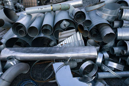 Recyclable metal waste in heap outdoorの写真素材