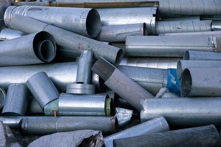 Recyclable metal waste in heap outdoorの写真素材