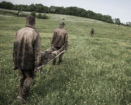 Member of history club wears historical German uniform during historical reenactment of Kiev Liberation in 1943 in Kiev, Ukraineの写真素材