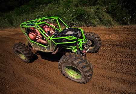 Unidentified rider on a quad bike participates in the Championship of Russia in Uzhgorod, Russia.の写真素材