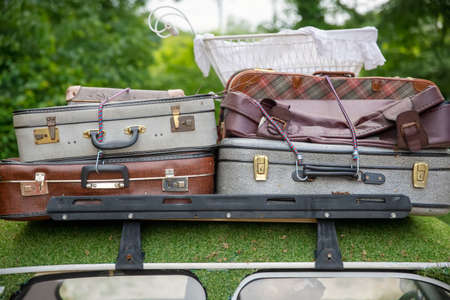 Top of car full of suitcases ready for travelの写真素材