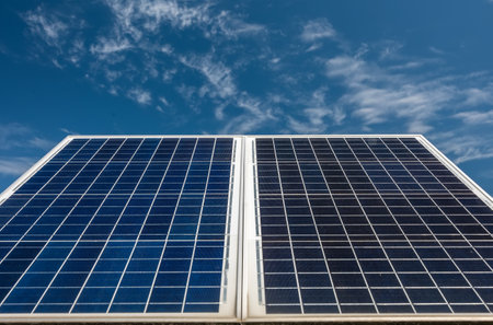 Detail of blue solar panels with blue skyの写真素材