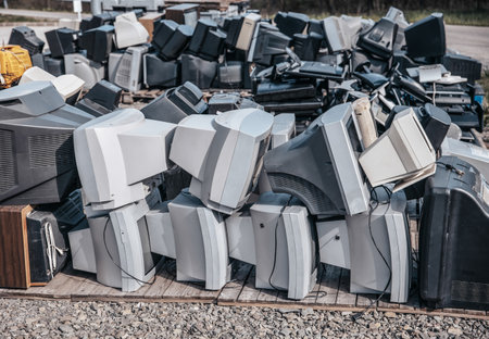 Heap of electronical appliances waste, monitors and TVsの写真素材