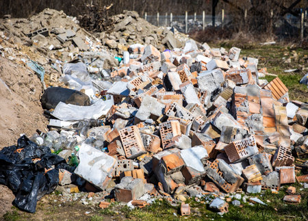 Heap of construction waste, concrete and brick