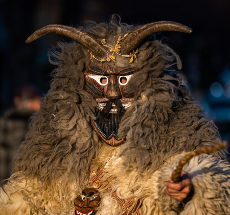 MOHACS, HUNGARY - MARCH 4: Unidentified people in mask participants at the Mohacsi Busojaras, it is a carnival for spring greetings) March 4, 2025 in Mohacs, Hungaryの写真素材