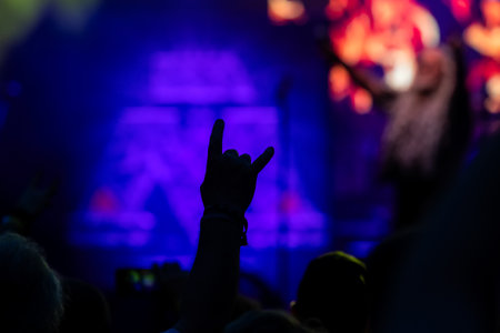 Devil's horn gesture in rock concert