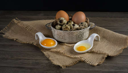 fresh chicken and quail eggs prepared for cooking