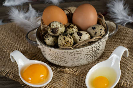 fresh chicken and quail eggs prepared for cooking