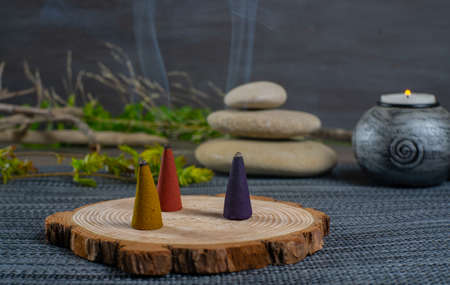 zen image with different types of incense with smokeの写真素材