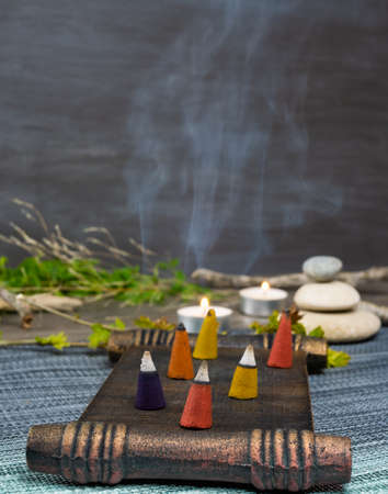 zen image with different types of incense with smokeの写真素材