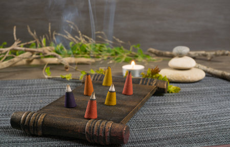 zen image with different types of incense with smokeの写真素材