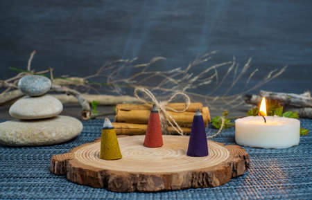 zen image with different types of incense with smokeの写真素材