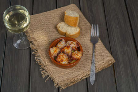 Galician octopus typical food from the north of Spain with sweet paprika salt and Andalusian olive oil exquisite tapaの写真素材