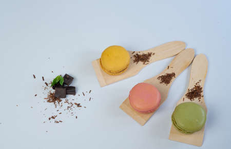 colorful macarons on white background