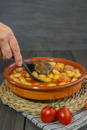 beans with chorizo and blood sausage typical dish from the north of spainの写真素材