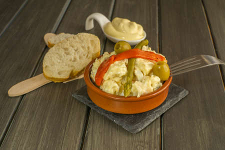 Russian salad typical fresh summer food with hard-boiled egg, pepper and tunaの写真素材