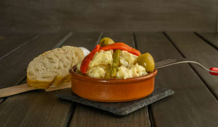 Russian salad typical fresh summer food with hard-boiled egg, pepper and tunaの写真素材