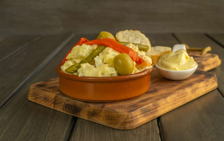 Russian salad typical fresh summer food with hard-boiled egg, pepper and tunaの写真素材