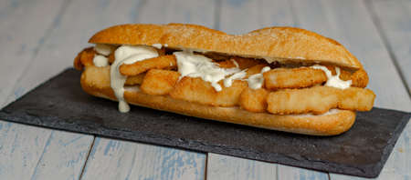typical squid sandwich with mayonnaise sandwich Madrid, Spainの写真素材