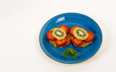 fresh summer fruit salad on a white backgroundの写真素材