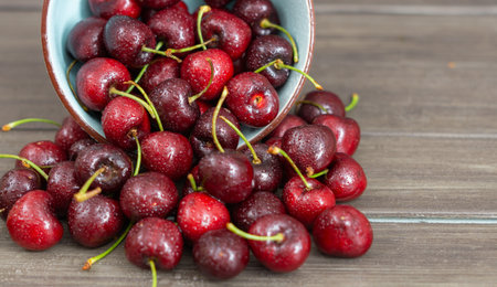 fresh red summer cherries with water dropsの写真素材