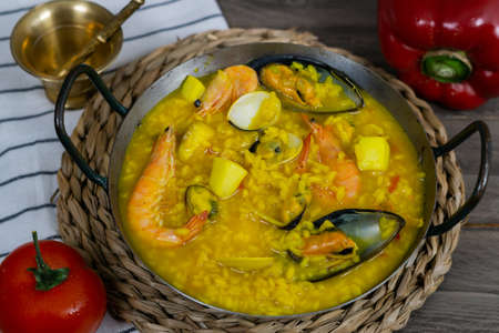 Malaga broth rice with seafood typical food from southern Spainの写真素材