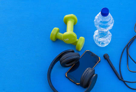 weights and fitness training equipment on the gym floorの写真素材