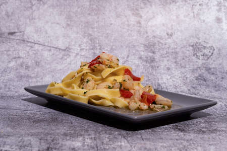 fresh pasta with prawns and red peppers fettuccine copy-spaceの写真素材