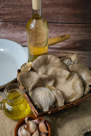 fresh thistle mushrooms freshly picked from the field ready to cook on a wooden backgroundの写真素材