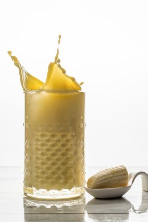 strawberry smoothie with natural fruit, white background and copy-spaceの写真素材