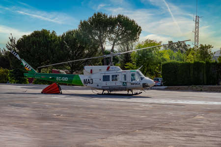 firefighting helicopter parked at the heliport waiting for a forest fire warning.のeditorial素材