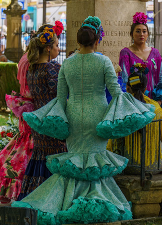 08/31/2022 Ronda,Malaga,Andalucia,Spain meeting of women at the fair of ronda in the alameda with traditional dress of andaluciaのeditorial素材