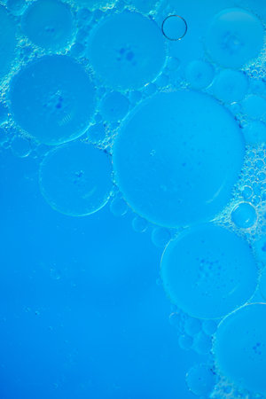 abstract blue background of oil droplets macro photography