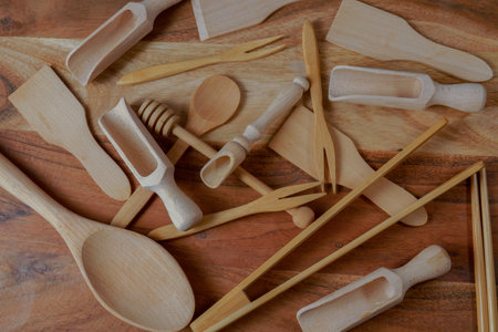 top view of a group of handmade wooden kitchen utensilsの写真素材