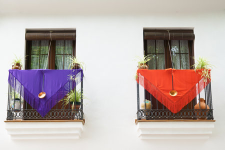 balcony decorated with traditional colored Manila Shawl on a festive dayの写真素材