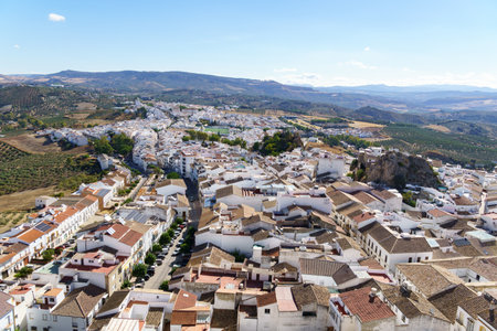 Olvera town, Cadiz, Spain displaying traditional white houses and surrounding olive groves in Olvera, Cadiz, Spainの写真素材