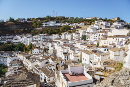Looking down at Setenil de las Bodegas, a white village in rural Andalusia, with traditional houses built into the rock in Setenil de las Bodegas, Cadiz, Spainの写真素材