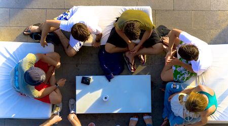 Anonimous people gathered and enjoying a conversation.の写真素材