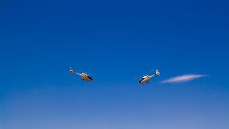 Two acrobatic copters face to faceの写真素材