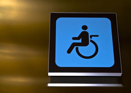 Symbol for a restroom adapted to wheelchair users.の写真素材