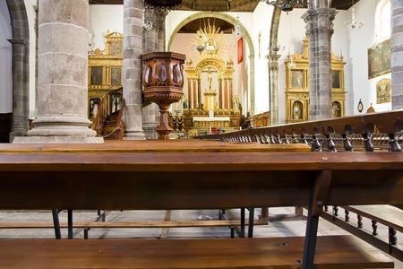 Old Spanish church from the pew point of view.の写真素材