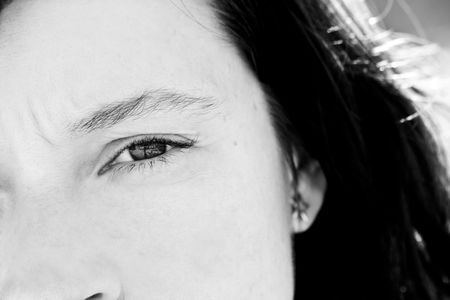 Portrait of woman with awe reflection in her eye. Black and white toned.の写真素材