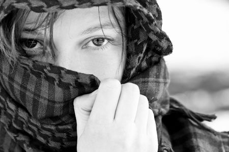 Staring woman portrait covered by veilの写真素材