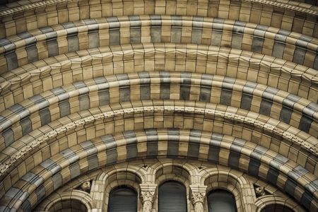 Entrance detail at Natural History Museum at London. Highly detailed stone, dark styled.の写真素材