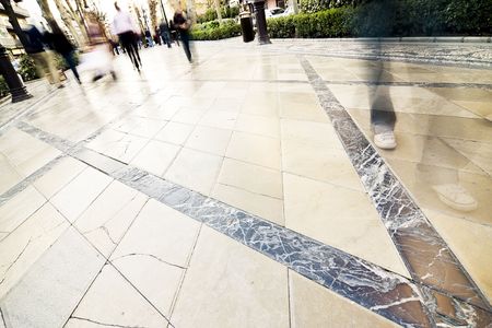 Walking crowd on the squareの写真素材