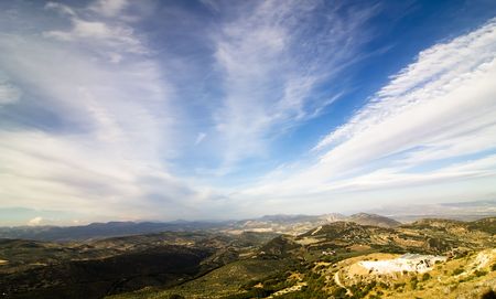 Mediterranean landscape under white cloudscape.の写真素材