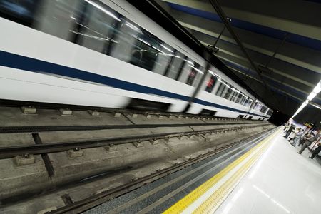 Subway station with people waiting