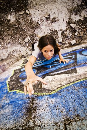 Anguished young woman requesting helpの写真素材