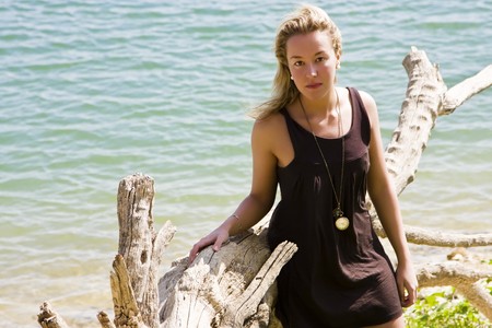 Young blond woman posing in nature.の写真素材
